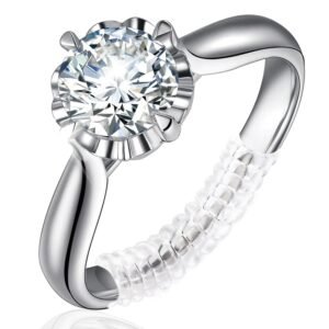 Silver solitaire ring with a clear spiral ring size adjuster wrapped around the band