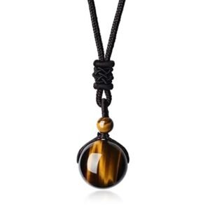 Tiger eye necklace with a genuine tiger eye stone in a gold-tone oval frame